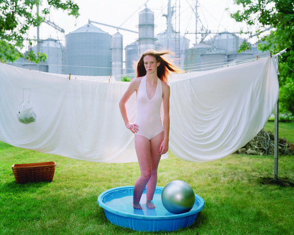 Angela Strassheim: Untitled (Alicia in Pool), 2006. 50 x 60 inches. Archival pigment print mounted to aluminum composite board. Courtesy of the artist and Andrea Meislin Gallery