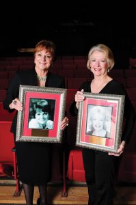 Anne Kraft and Jean Rahner with their founders portraits.